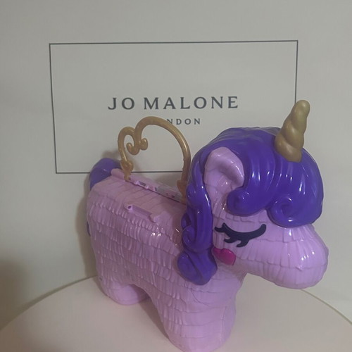 Polly Pocket Unicorn Party Playset used by Mattel