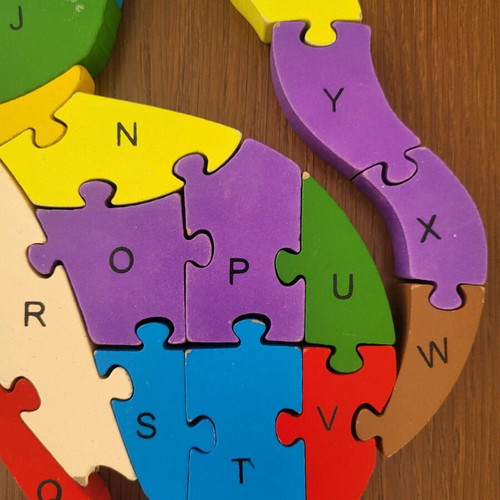 Wooden educational cat puzzle like new with numbers and English letters