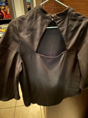 Desiree blouse with batwing sleeve and back opening like new, black
