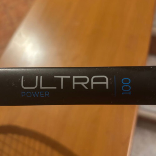 Wilson Ultra Power 100 tennis racket used with 2 broken strings