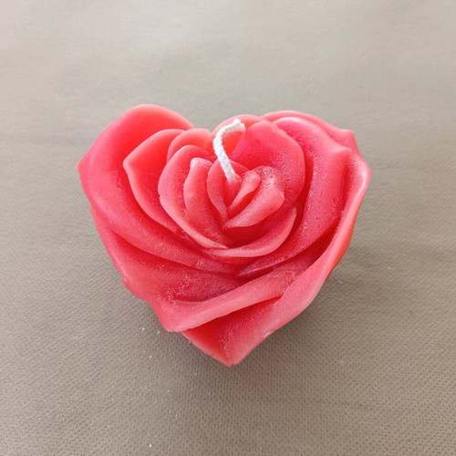 Decorative hands new, handmade art with candle heart rose