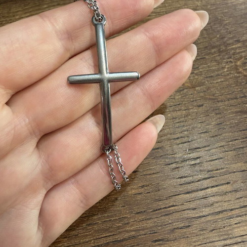 Cross bracelet new, silver and black steel