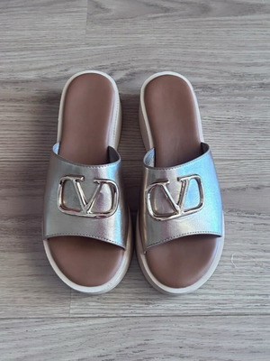 Platform slippers like new, gold color, size 40