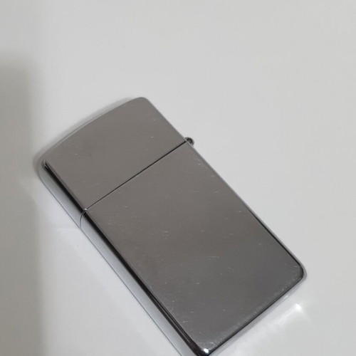 Zippo lighter used small size with engraved design