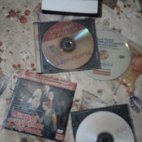 Three Greek movies used with 2 bonus DVDs