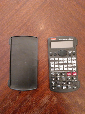 Calculator used, old, needs battery