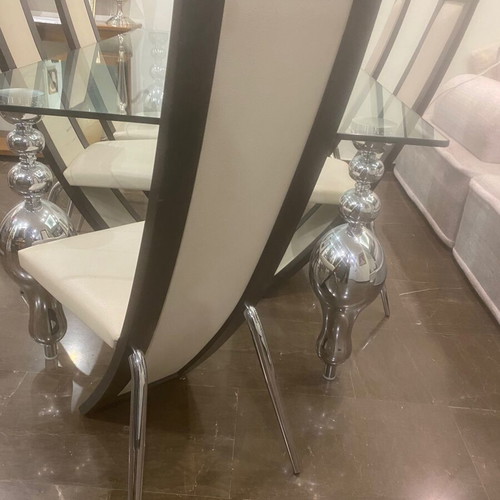Glass dining table with 6 used Italian leather chairs, inox legs