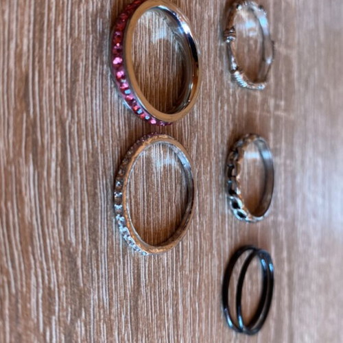 Set of 6 rings used, silver, black and pink colors