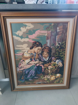 Knitted frame like new with wooden frame