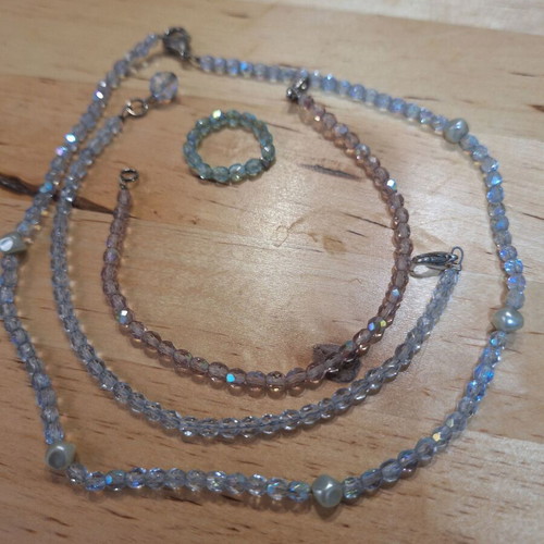 Vintage jewelry set used with necklace, bracelets and ring