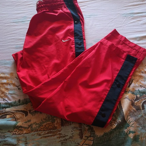Nike sports pants with side buttons like new, black and red, size L