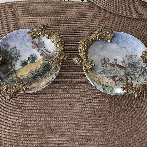 Andreas Zymatikas handpainted porcelain decorative plates, pair