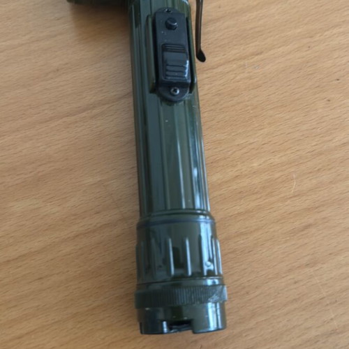 Handheld and pocket flashlight used, with clip and red filter