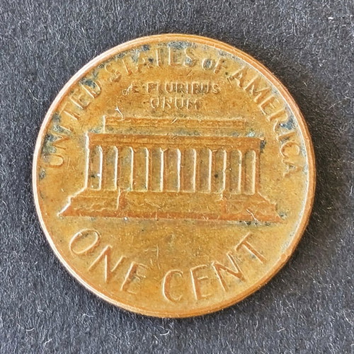 One cent 1978 used with double struck D error