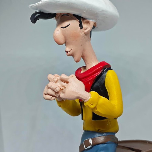 Lucky Luke collectible figure in barrel like new 19cm