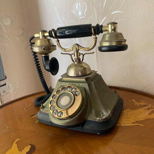 Vintage telephone device used, decorative antique