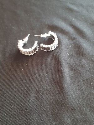 Earrings like new, decorated with sparkling stones