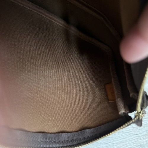 Louis Vuitton Noe inner wristlet bag, brown