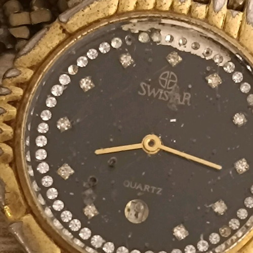 Swistar watch 18k gold plated used with visible signs of wear
