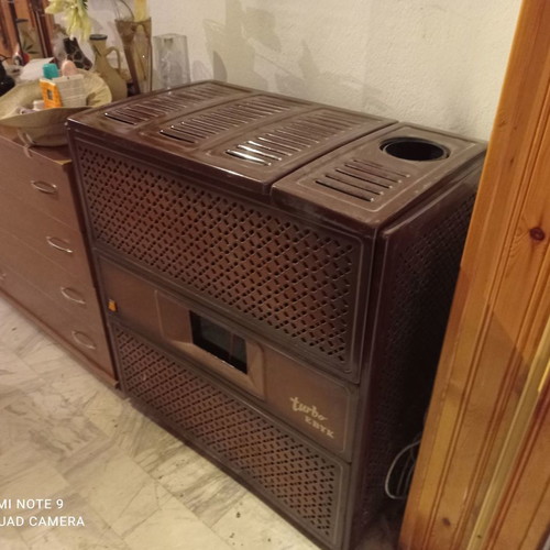 Oil heater with ventilator used, gift chimney included