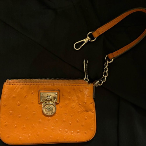 Michael Kors mini leather wallet used orange