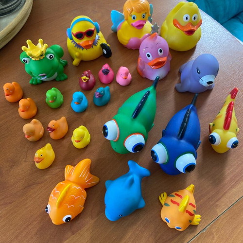 Collection of ducks and fish toys used for decoration and crafts
