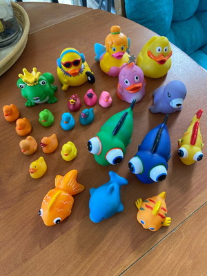 Collection of ducks and fish toys used for decoration and crafts