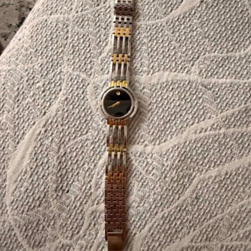 Movado Esperanza ladies watch used, silver-gold tone bracelet, black dial