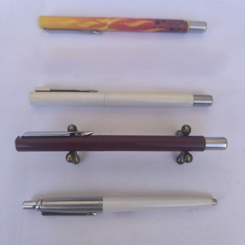 Parker set with Jotter pen and three Vector rollerball pens