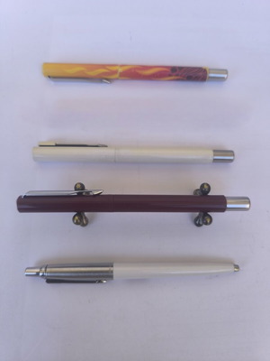 Parker set with Jotter pen and three Vector rollerball pens
