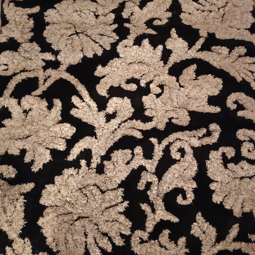 Black and white rug with embossed designs 226x152 cm