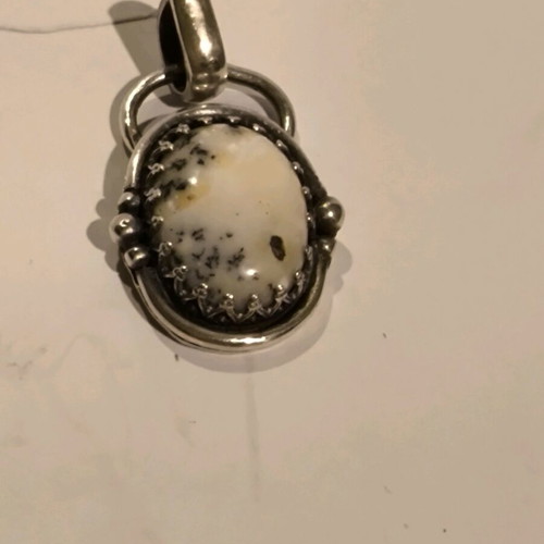 Silver handmade pendant with dendritic opal like new