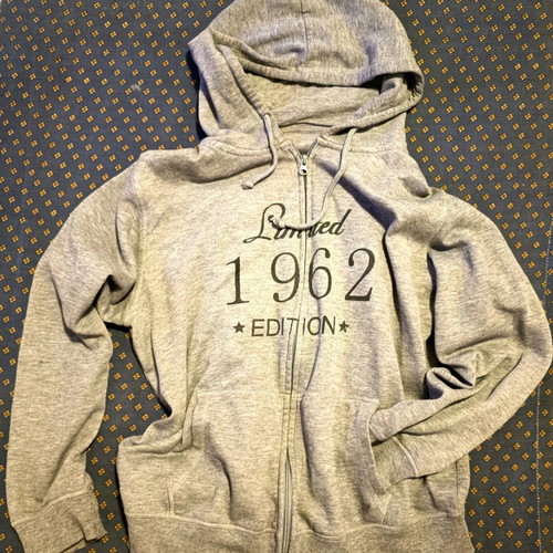 Gray jacket with hood, drawstring and zipper used