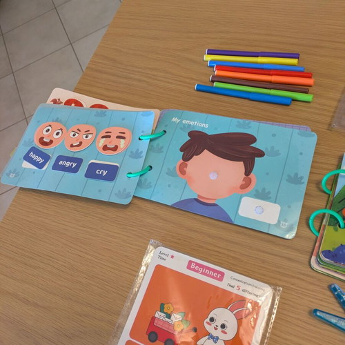 Busy books, Crayola scissors, find the differences sheets, and crayons like new