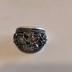 Silver-colored ring with stones like new
