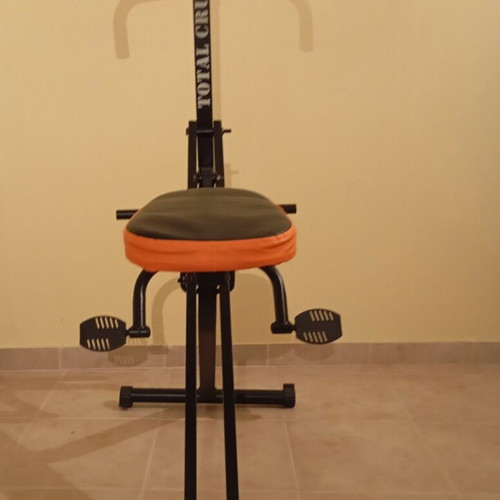 Total Crunch fitness machine like new, foldable and sturdy