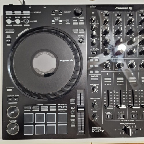 Pioneer DDJ-FLX10 DJ controller used with soft case and music collection