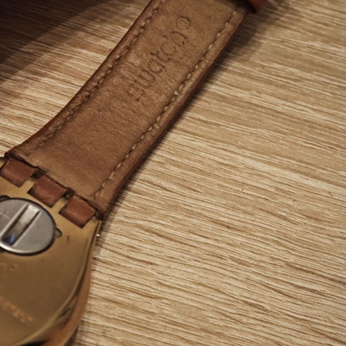 Swatch wristwatch women's used with camel strap and gold details