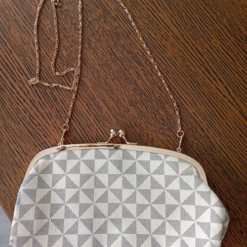 Shoulder and hand bag like new with detachable gold strap