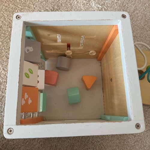 Gerardo's wooden activity cube used