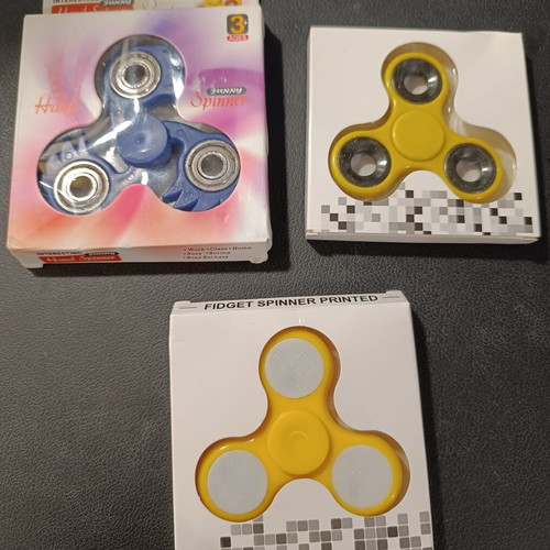 Fidget spinners used, pack of 3 with lights and wing design