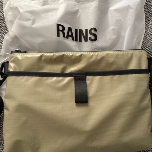Rains crossbody bag new, waterproof, soft khaki color