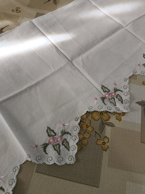 White doily with flowers like new