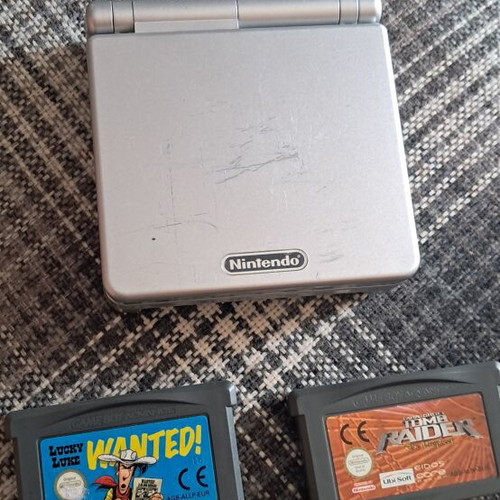 Game Boy Advance console with 2 games