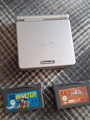 Game Boy Advance console with 2 games