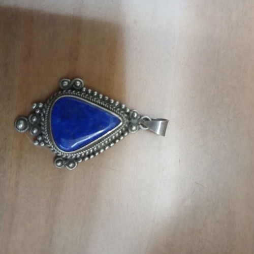 Silver pendant with blue stone like new