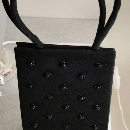 Pocket bag embroidered with black beads like new