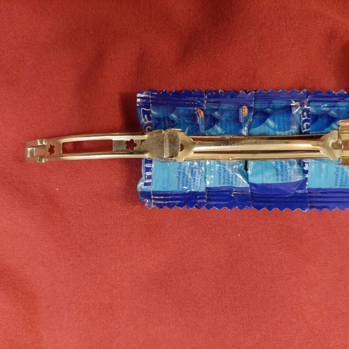 Mentos hair clip used, blue vintage