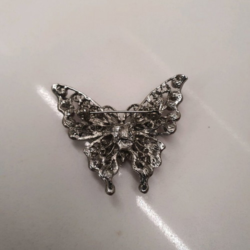 Butterfly pin like new