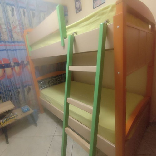 Bunk bed with anatomical mattresses and desk like new